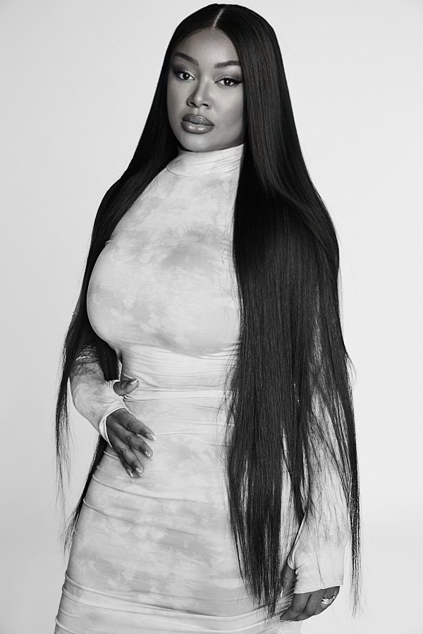 Woman during online wig consultation with expert stylist